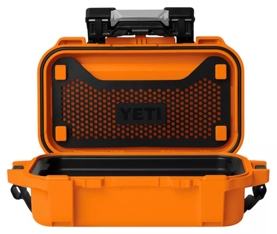Orange YETI LoadOut GoBox 1 gear case open against a white background