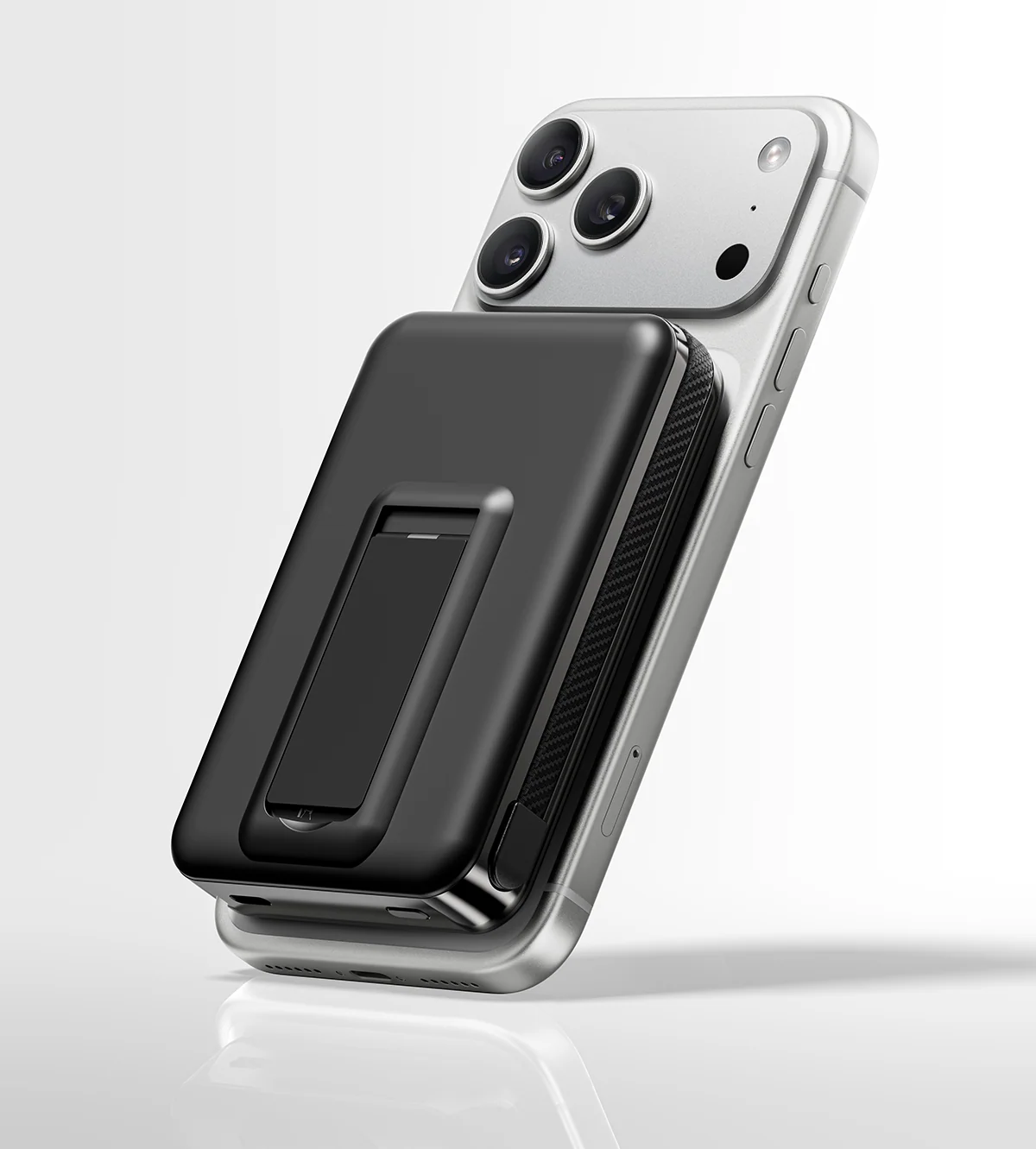 Kuxiu S3 25W 10K Kuxiu S3 25W 10K magnetic power bank attached to a silver iPhone